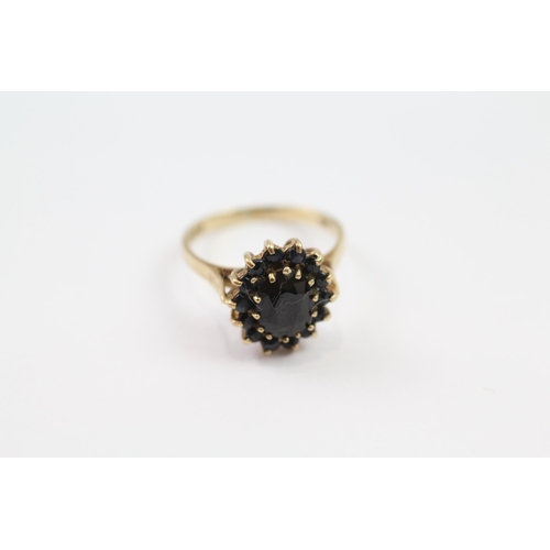 13 - 9ct gold sapphire 1980's cluster ring (2.7g) Size  M 1/2