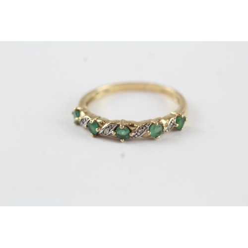 131 - 9ct gold emerald & diamond half eternity ring (1.9g) Size  P