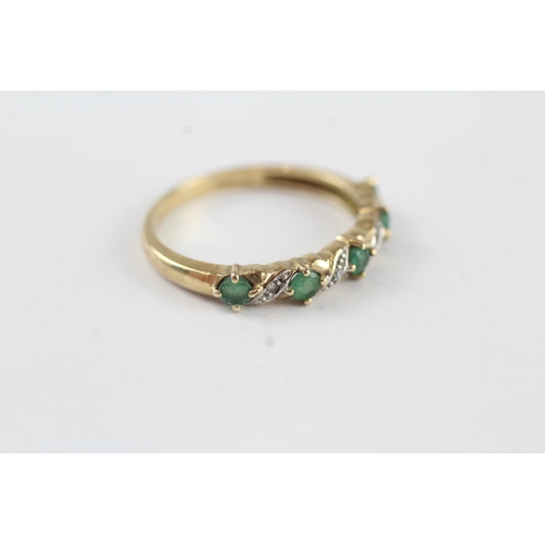 131 - 9ct gold emerald & diamond half eternity ring (1.9g) Size  P