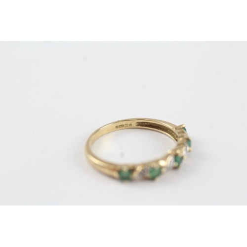 131 - 9ct gold emerald & diamond half eternity ring (1.9g) Size  P