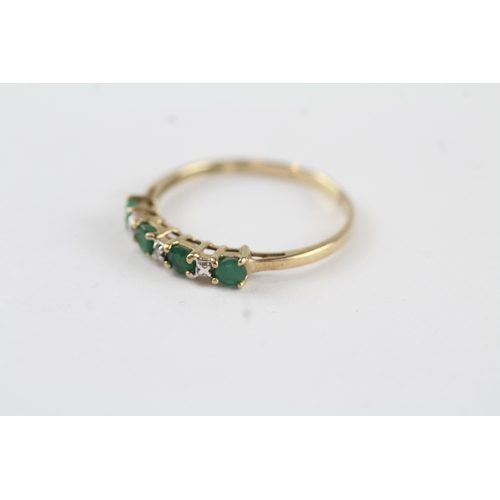 132 - 9ct gold emerald & diamond half eternity ring (1.1g) Size  P