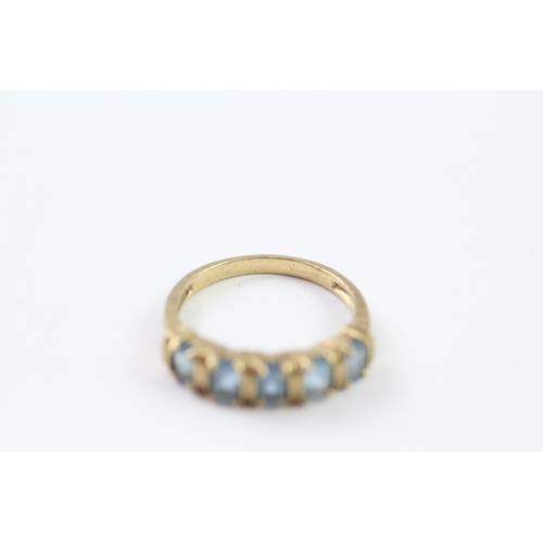 141 - 9ct gold blue gemstone five stone ring (2.5g) Size  N