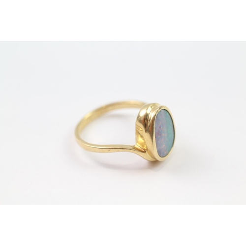 144 - 14ct gold boulder opal dress ring (3.8g) Size  O