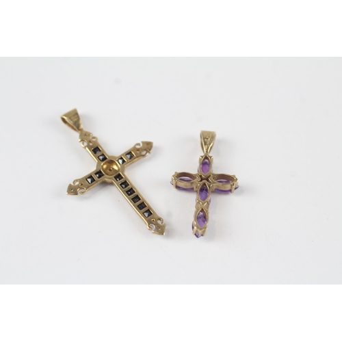 25 - 2 x 9ct gold diamond, sapphire & amethyst cross pendants (2.4g)