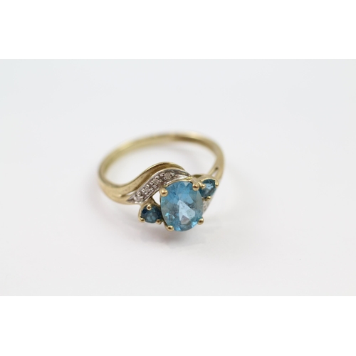 38 - 9ct gold blue topaz & diamond dress ring (2.1g) Size  O