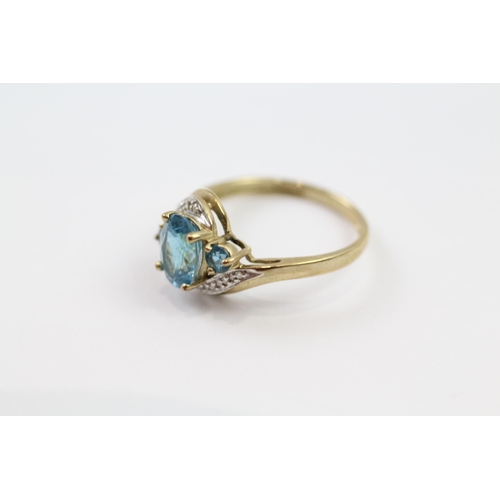 38 - 9ct gold blue topaz & diamond dress ring (2.1g) Size  O