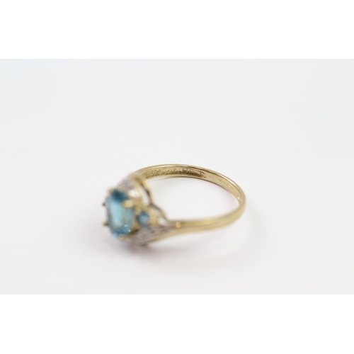 38 - 9ct gold blue topaz & diamond dress ring (2.1g) Size  O