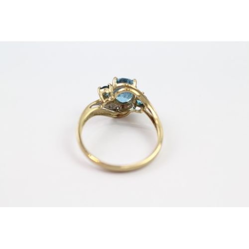 38 - 9ct gold blue topaz & diamond dress ring (2.1g) Size  O