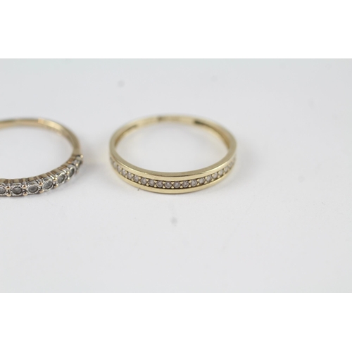 42 - 2x  half eternity rings, 1x with diamonds, 1x with CZ (2g) Size  L + M 1/2