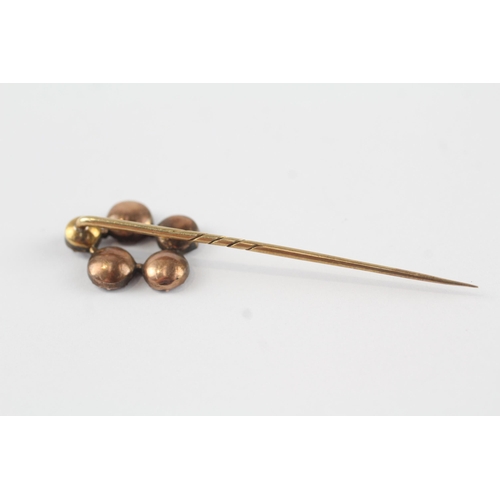 48 - 9ct gold Georgian foiled back garnet stick pin (2.5g)