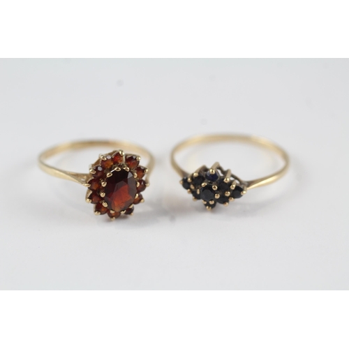 51 - 2 x 9ct Gold Sapphire & Garnet Rings (3.0g) Size  P + Q