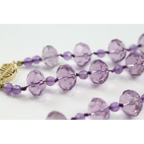 55 - 14ct gold faceted purple glass & amethyst bead necklace (65.6g)