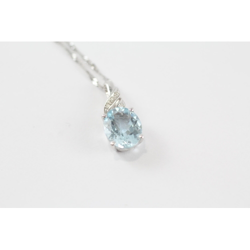 68 - 9ct gold aquamarine & diamond pendant & chain (2.6g)