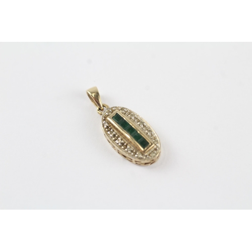 73 - 9ct gold diamond & emerald pendant (1.4g)