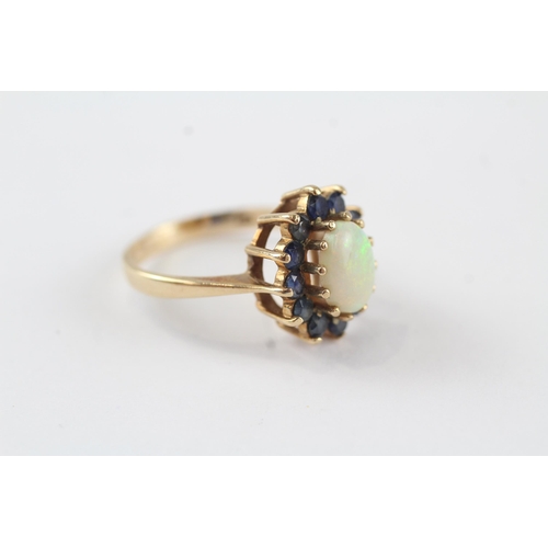 74 - 9ct gold white opal & sapphire oval cluster ring (3.1g) Size  L