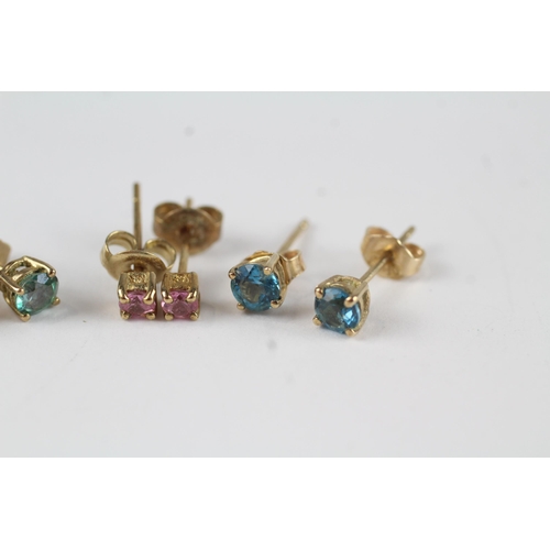 76 - 3 x 9ct gold pink sapphire & blue gemstone stud earrings (1.9g)