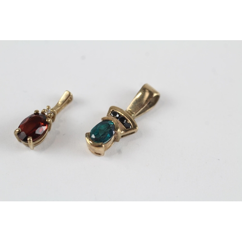 94 - 3 x 9ct gold diamond, ruby and blue gemstone set pendants (3.3g)