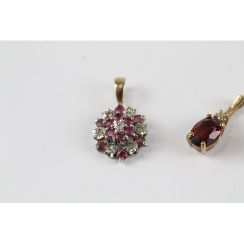 94 - 3 x 9ct gold diamond, ruby and blue gemstone set pendants (3.3g)