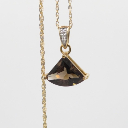 70 - 9ct gold smokey quartz & diamond pendant & chain (2.2g)