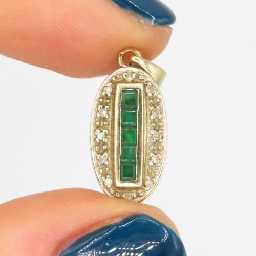 73 - 9ct gold diamond & emerald pendant (1.4g)