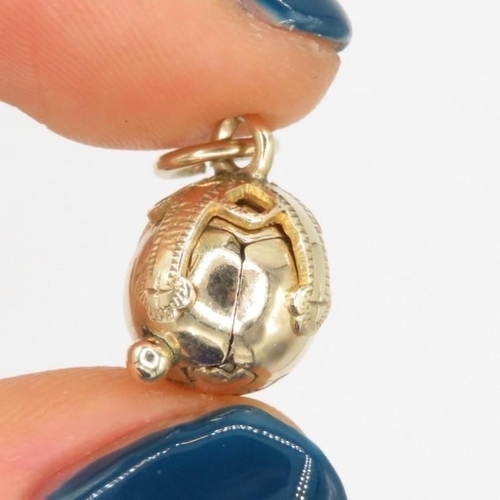 84 - 9ct gold & silver masonic orb charm (3.5g)