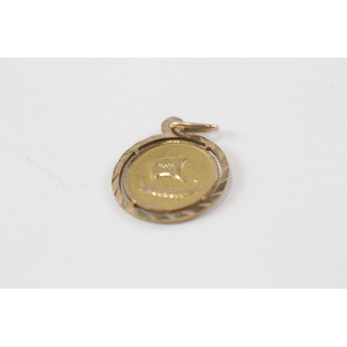 1 - 9ct gold round pendant (1.4g)