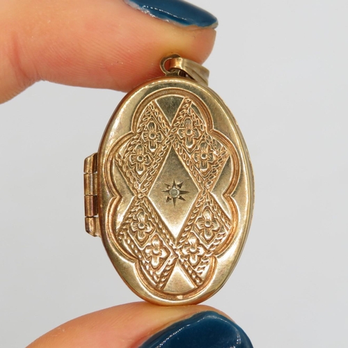 107 - 9ct gold vintage diamond set locket (3.2g)