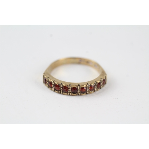 113 - 9ct gold vintage garnet set half hoop eternity ring (2.6g) Size  O