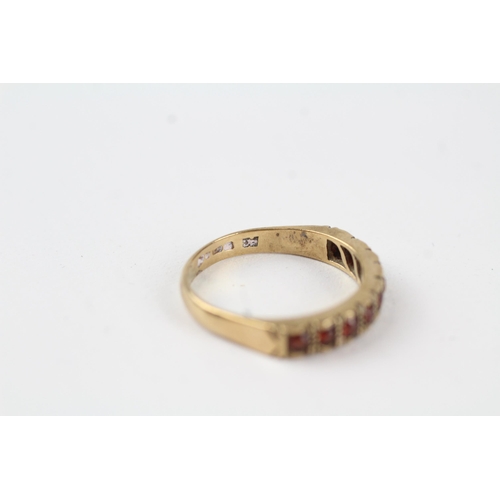 113 - 9ct gold vintage garnet set half hoop eternity ring (2.6g) Size  O