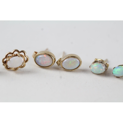 12 - 3 x 9ct gold white opal stud earrings (2.5g)