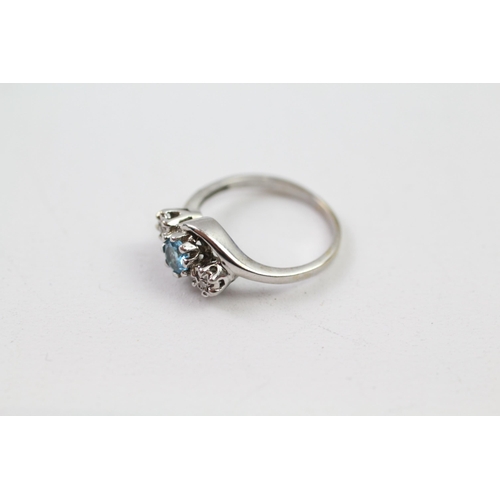 138 - 9ct white gold diamond & topaz three stone ring (1.9g) Size  J