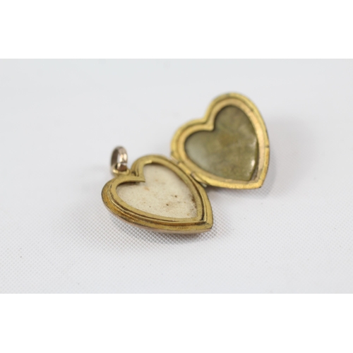 140 - 9ct gold back & front heart locket pendant (1.4g)