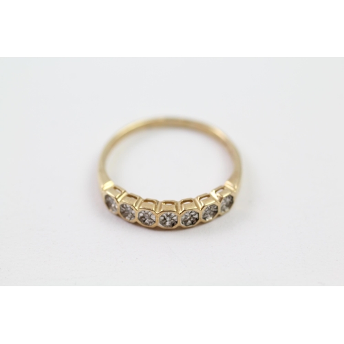 142 - 9ct gold diamond seven stone ring (2.3g) Size  U+1/2