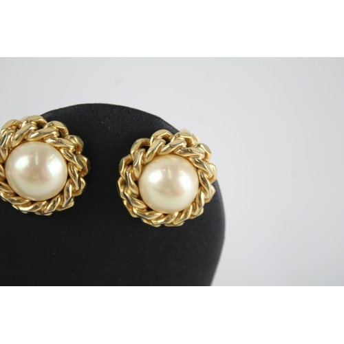 160 - Two pairs of faux pearl clips on earrings by designer Christian Dior (34g)