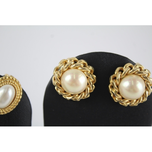 160 - Two pairs of faux pearl clips on earrings by designer Christian Dior (34g)