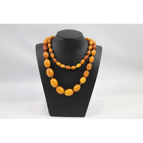 165 - Antique Amber graduated necklace individually knotted (66g)