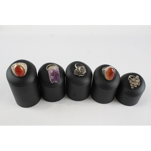 185 - Five silver cocktail rings including gemstone (57g)