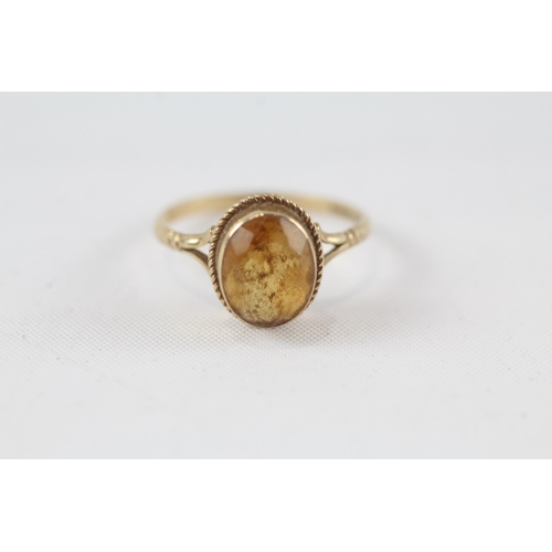 31 - 9ct gold citrine single stone ring (2g) Size  P+1/2