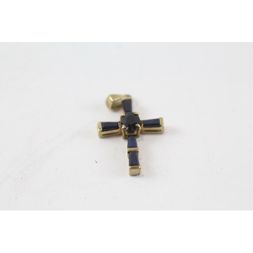 37 - 9ct gold sapphire cross pendant (1.4g)