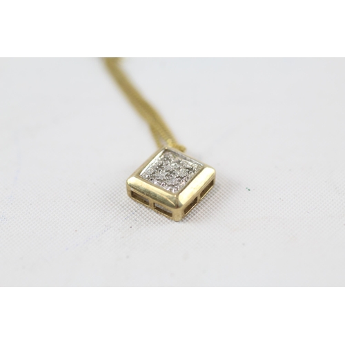 38 - 9ct gold and diamond pendant with gold chain (1.6g)