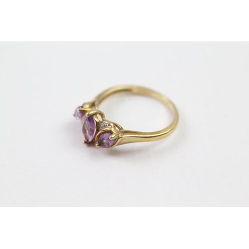 45 - 9ct gold amethyst three stone ring with diamond accent (2.7g) Size  P+1/2