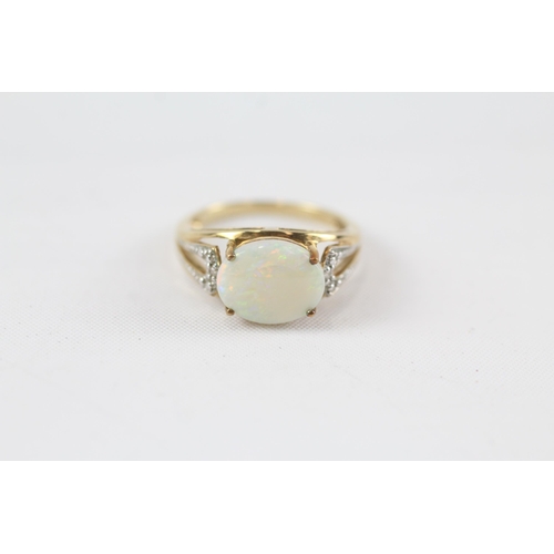 46 - 9ct gold opal single stone ring with diamond set shank (3g) Size  N