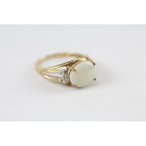 46 - 9ct gold opal single stone ring with diamond set shank (3g) Size  N