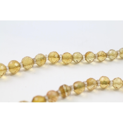 51 - 9ct gold clasp hand faceted citrine & rock crystal graduated single strand necklace (42.6g)