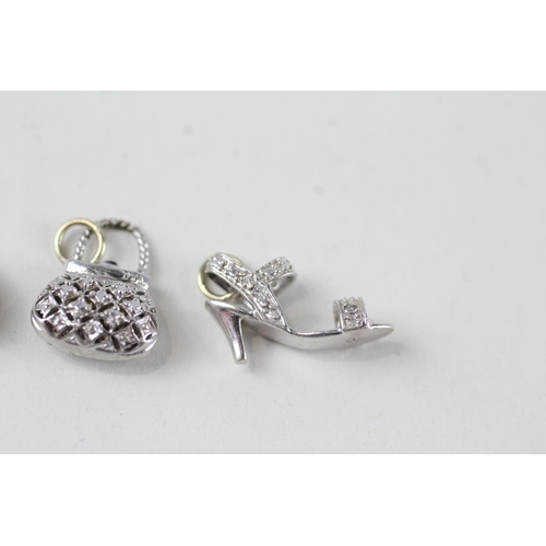 54 - 3 x 9ct white gold diamond charms inc. purse & shoes (3.5g)