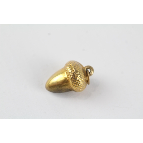 56 - 9ct gold acorn charm (0.7g)