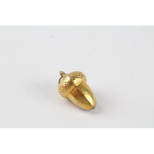 56 - 9ct gold acorn charm (0.7g)