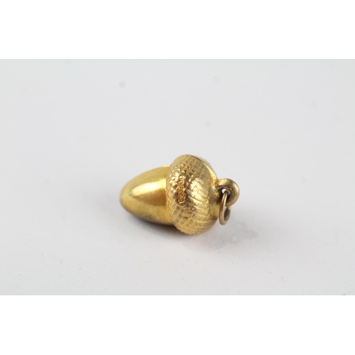 56 - 9ct gold acorn charm (0.7g)