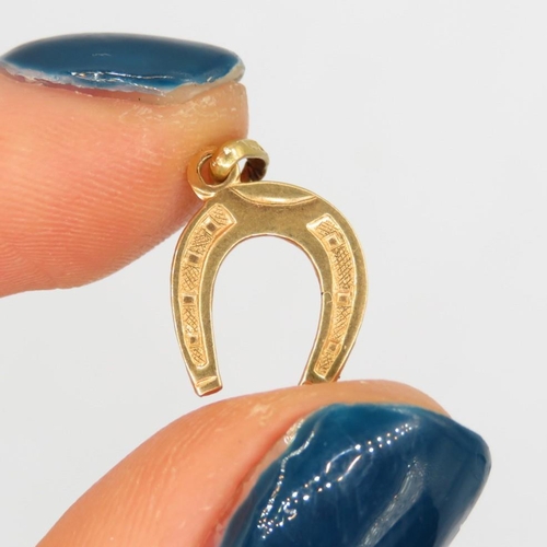 61 - 18ct gold Victorian lucky horseshoe charm (0.7g)