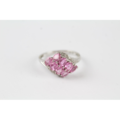 63 - 9ct gold pink sapphire & diamond cluster ring (2.4g) Size  O